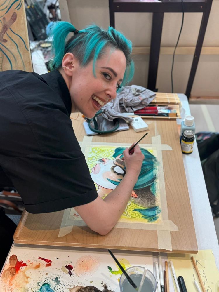 @juupiter.com busy working on their self portrait at the painting workshop.
