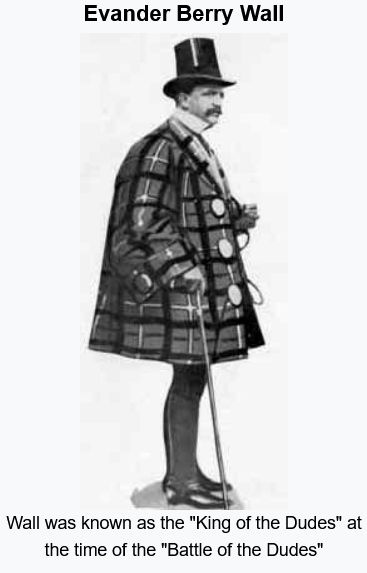 A very fancy Dude with a top hat, an extremely oversized coat, leggings, and shiny shoes with a cane. Can't forget the fabulous mustache. 