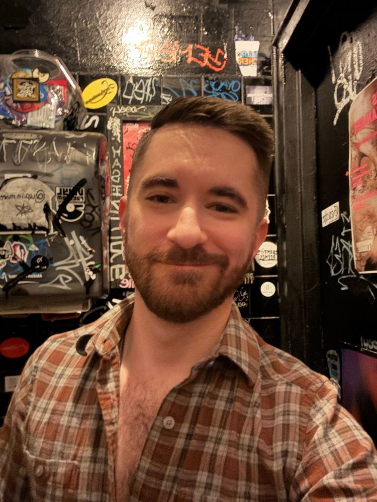 Selfie in a dive bar bathroom.