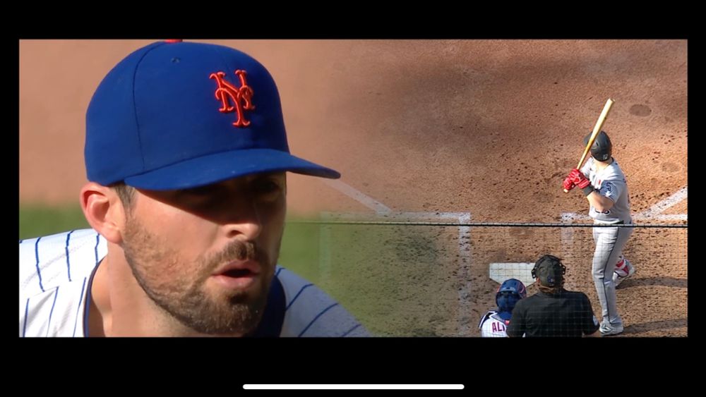 SNY screenshot of a close-up of Clay Holmes on the left side and a behind home plate view of Andrew Benintendi ready in the batter's box on the right during yesterday's White Sox vs Mets broadcast.