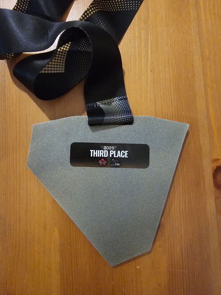 The back of the Van City Showdown medal showing Third Place