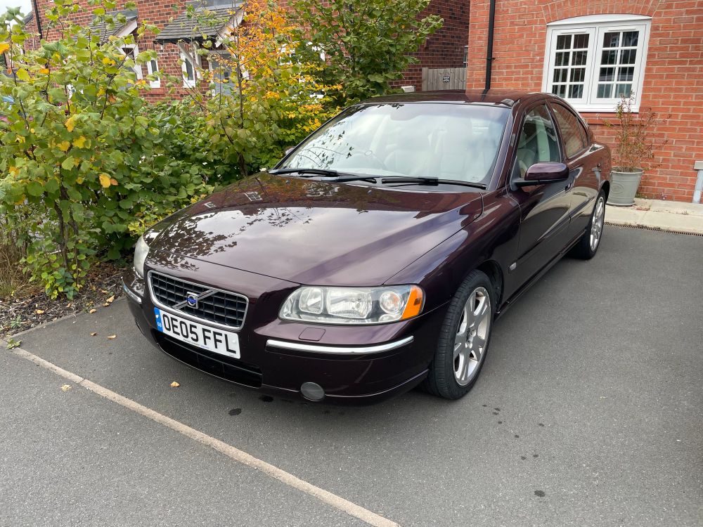 A dark purple metallic 2005 Volvo S60