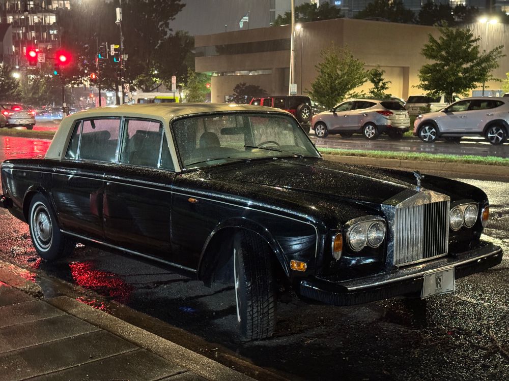 a black Rolls-Royce Silver Shadow II street parked in Washington DC
