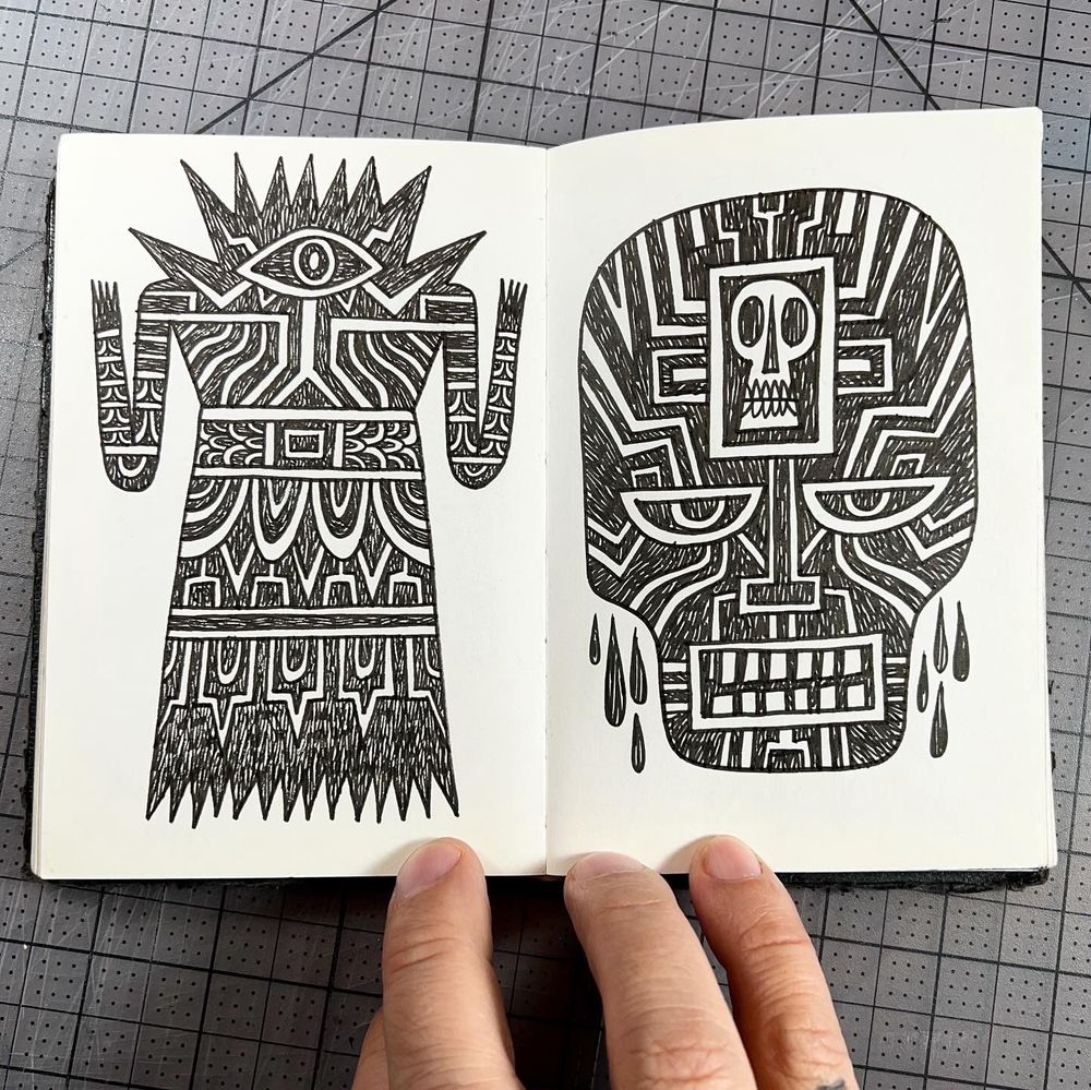 Scratchy black and white drawings of spectres