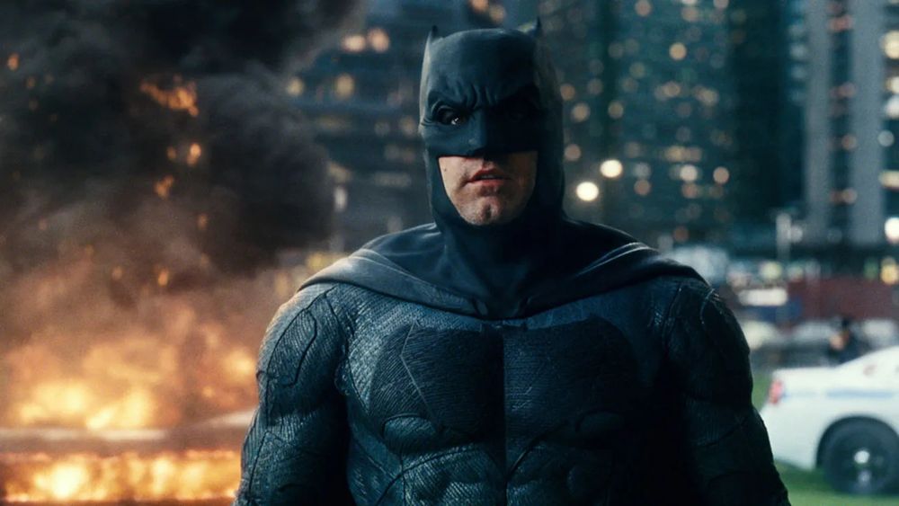 Ben Affleck, who is from Boston, dressed as Batman, who wears a black cape