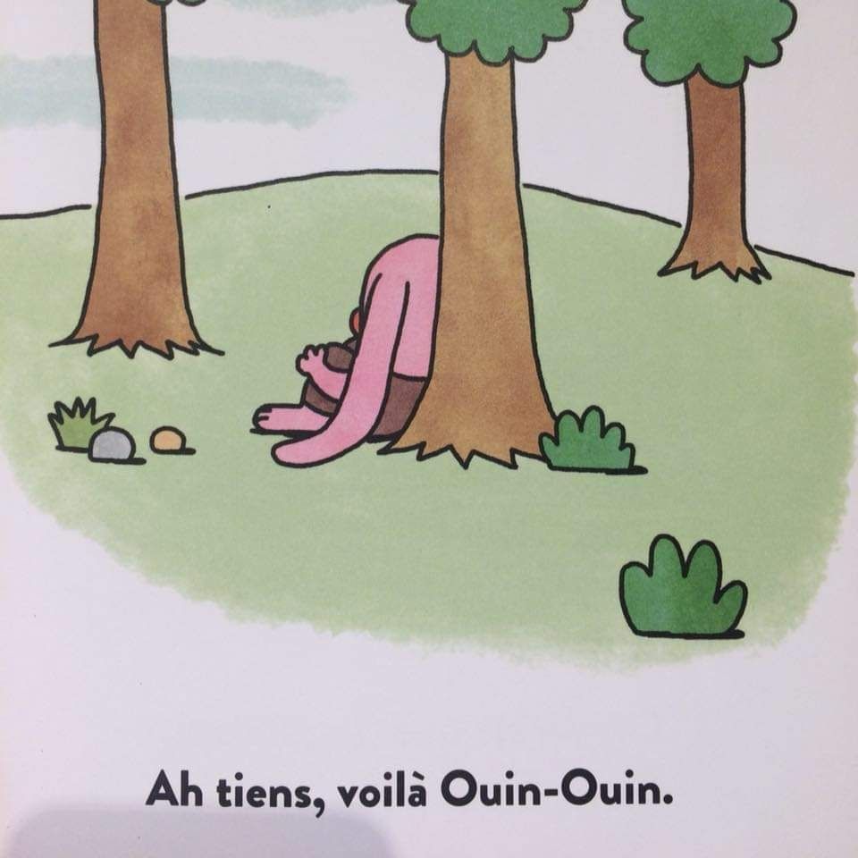 Image de marine assise le long d’un arbre et qui chouine. 
La légende en dessous "ah tiens, voilà Ouin-Ouin".