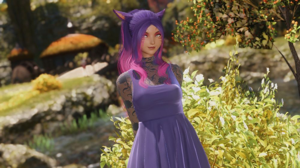 Losi wearing a purple dress standing in a lush green town