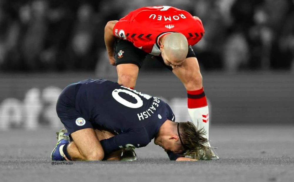 Oriol Romeu standing over Jack Grelish