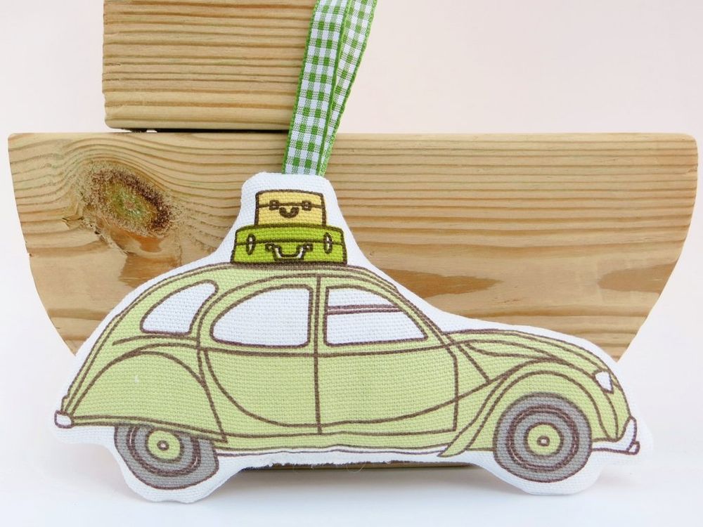 A green fabric Retro 2CV Citroen car air freshie ornament by misheleneous filled with polyester stuffing and lavender
