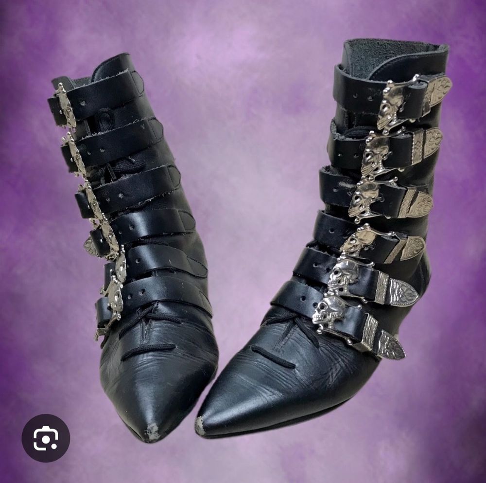 Screenshot of black 80s winkle picker goth boots with silver buckles
