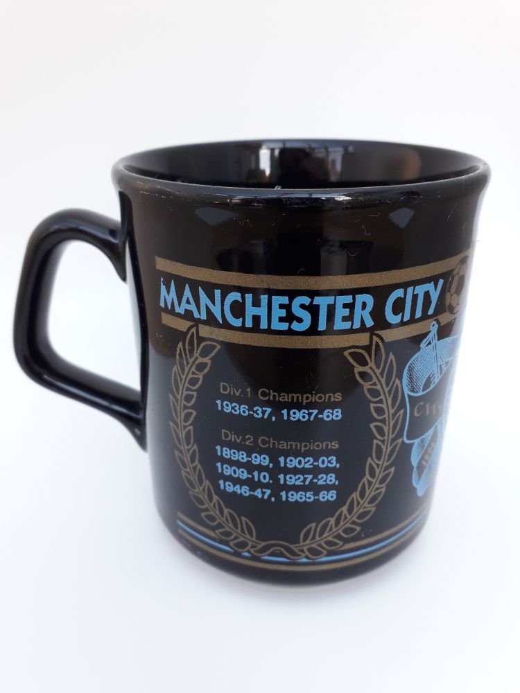 An old black and blue man city mug from god knows when. I've had it many many years