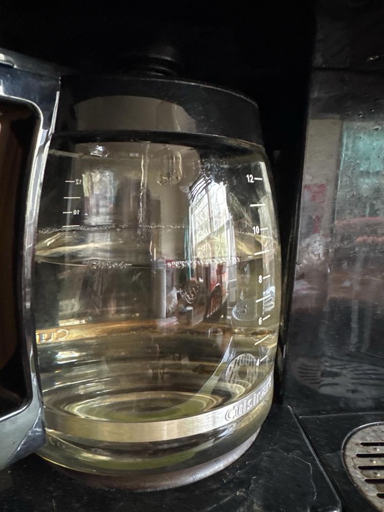 Coffee pot filling with water instead of coffee. 
