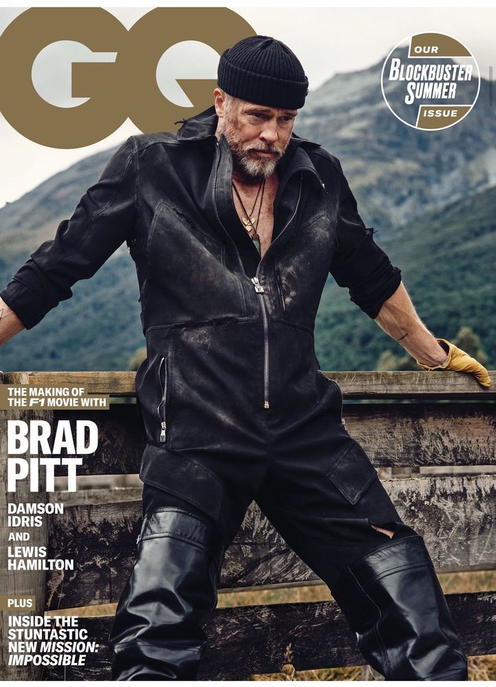 Brad Pitt on the cover of GQ wearing an all black ensemble including a beanie hat and leather waders for some reason. He is standing on a boat (?) in a knees akimbo pose looking like a man attempting to shit out a pineapple 