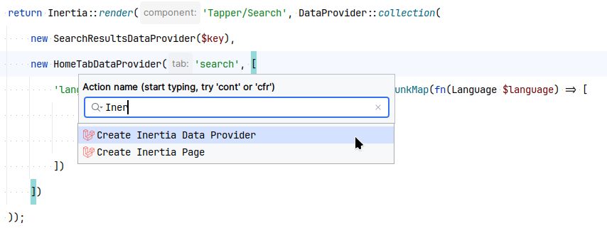 A screenshot of the Laravel Idea action menu showing a selected item of "Create Inertia Data Provider".