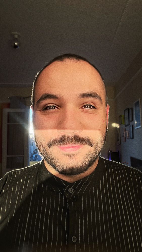 eu, Lucas, sorrindo com um baita sol atrás que quando tira uma foto boa tem que substituir em todo lugar