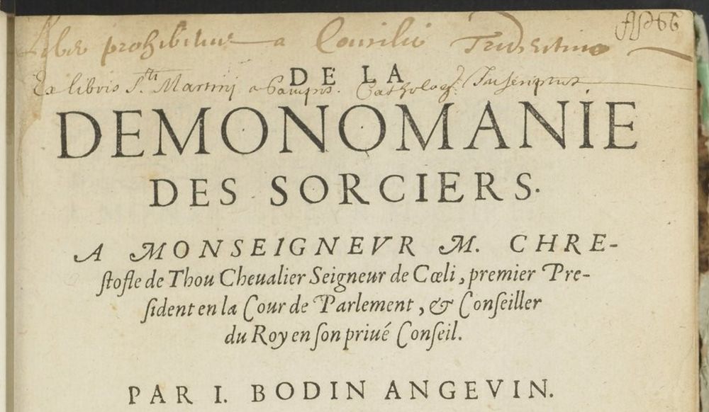 top part of the title page of Jean Bodin's De la demonomanie des sorciers with ownership marks ("Ex Libris") in two hands and two inks