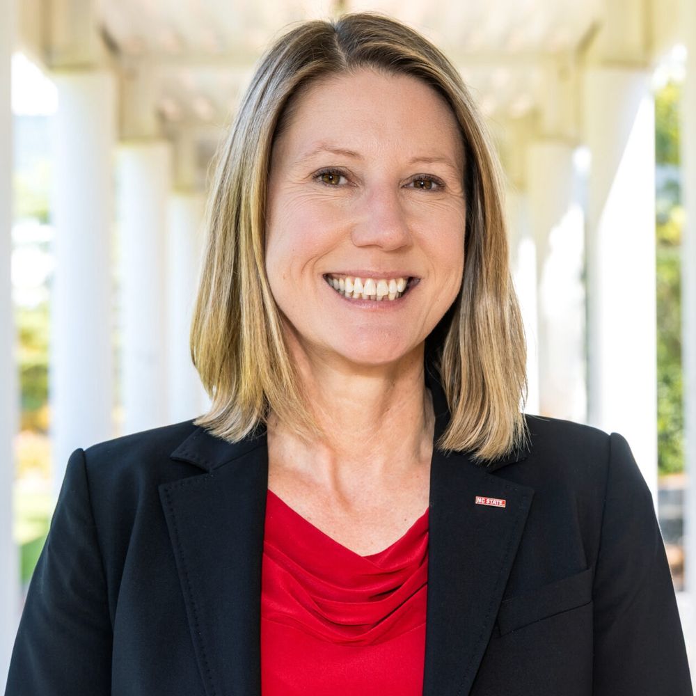 Krista Walton smiles at the camera.