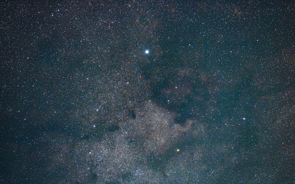 The star Deneb in the constellation Cygnus with some of the North America Nebula visible.