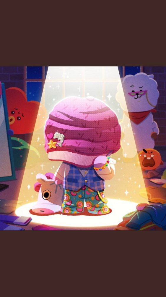 BT21 Mang holding mask, wearing an oversized dark pink hat, light pink shirt, purple plaid vest, and green pants with orange and pink objects that look like circles.