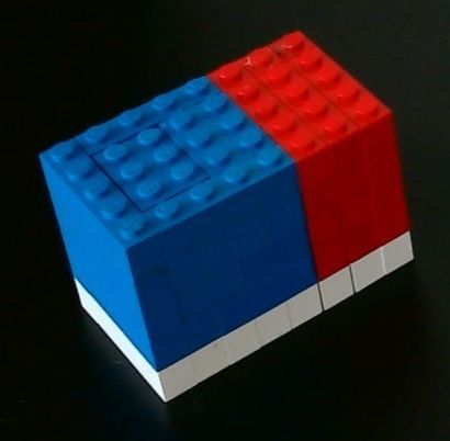 This LEGO cuboid represents f(x)=(x+0)(x+3)(x-1) =x³+2x²-3x the + sign represents the directions forward and right, the - sign represents 
