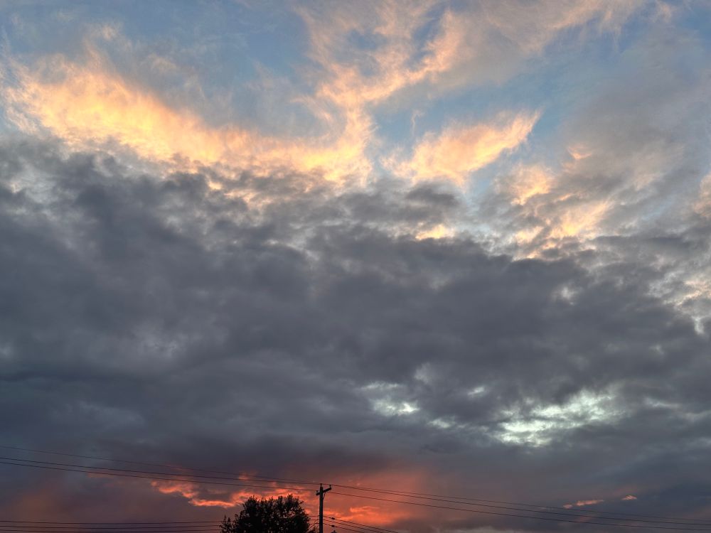 Sunset-tinged horizon, and broody clouds, on a gorgeous late autumn evening 