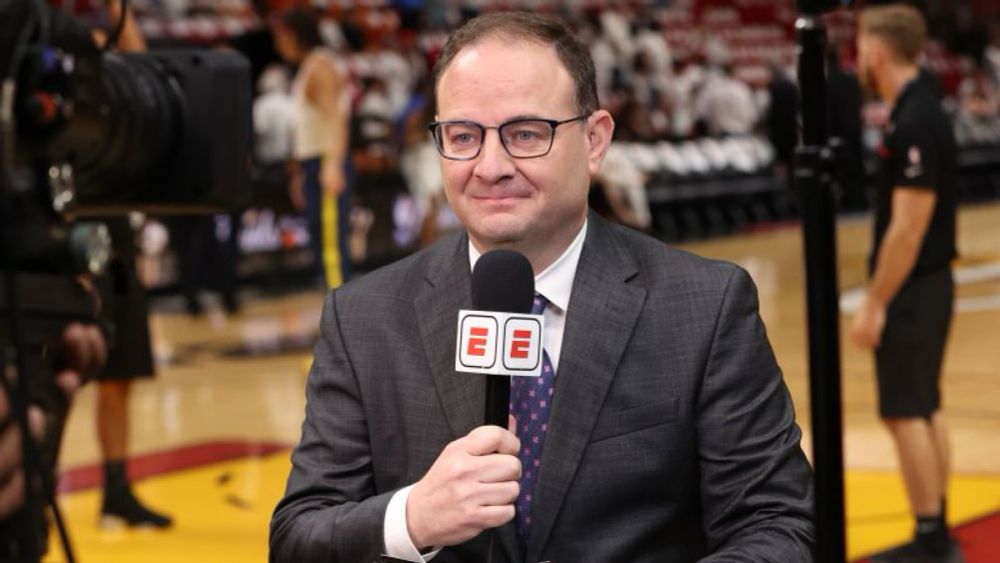 NBA insider Adrian Wojnarowski retires from ESPN to become basketball general manager at alma mater | CNN