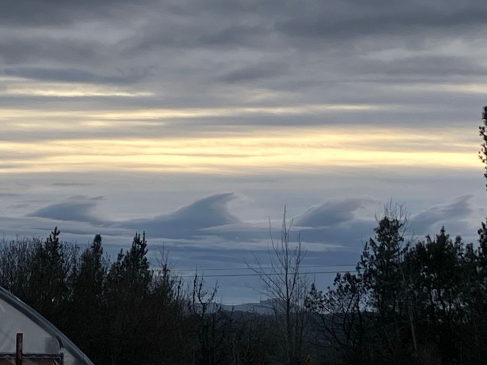 Clouds formed as ocean waves break against an unseen reef in the sky. 