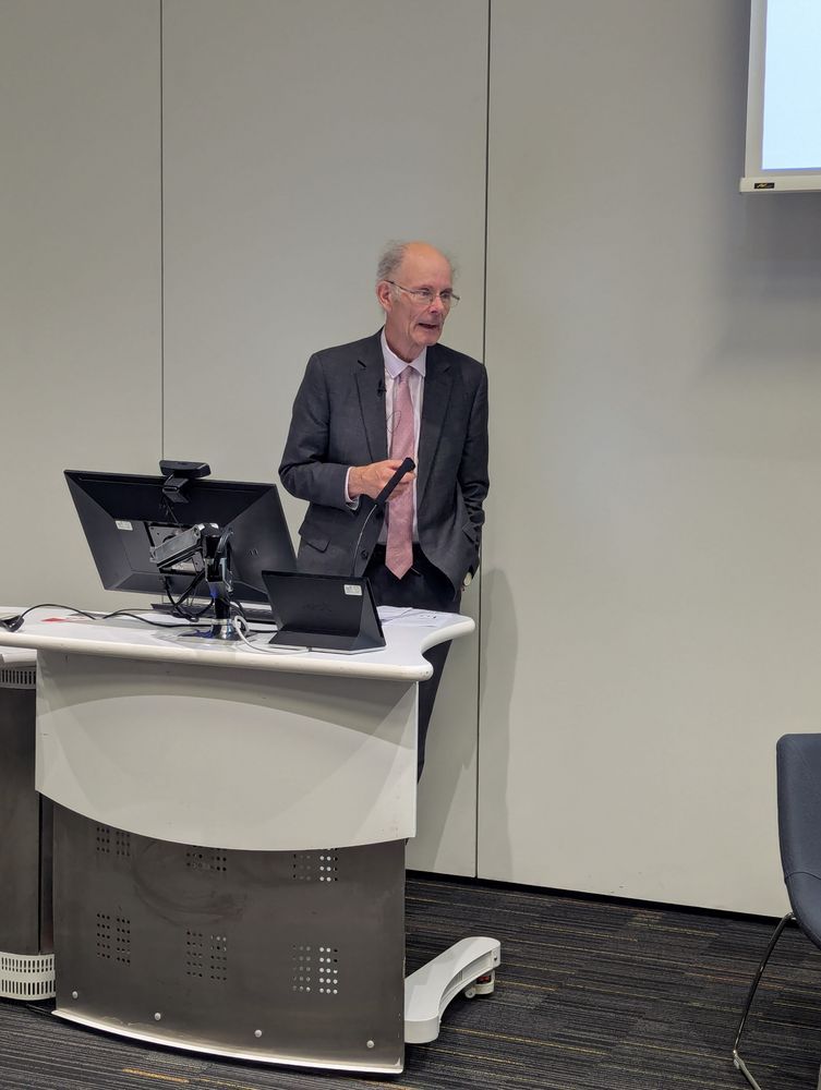 a photograph of professor sir John Curtice talking at our conference