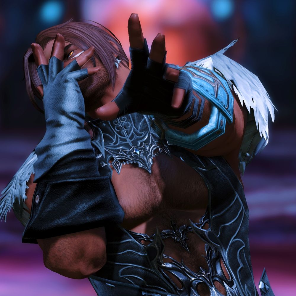 A photo of Tartarus (a male highlander from ffxiv). He is covering his face with one hand and reaching out towards the camera with the other. The only eye visible is bright orange. He wears a mostly black outfit, with a chest window on it. 