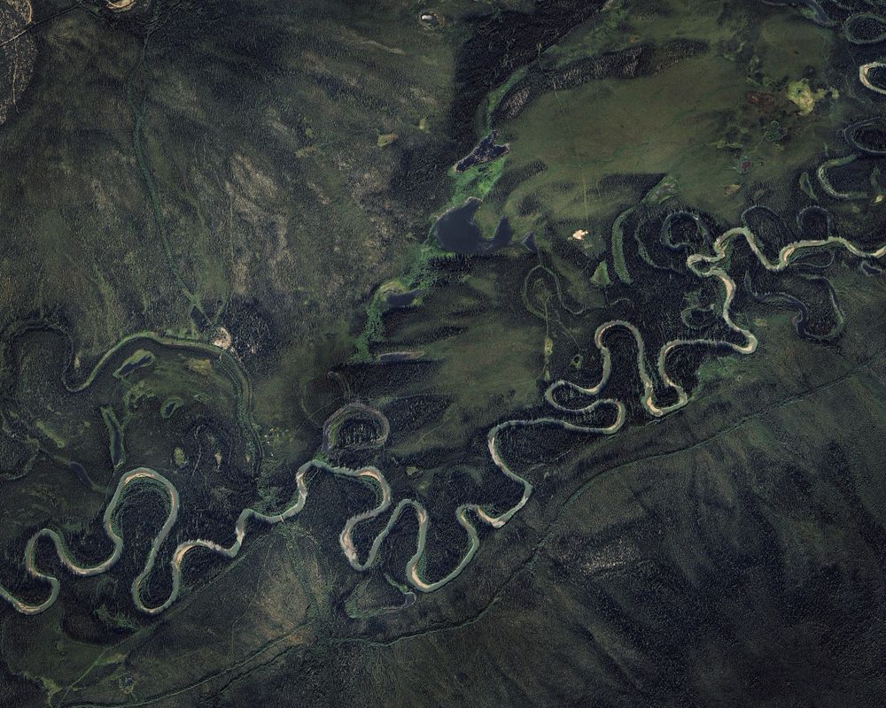 Satellite photo showing twists and turns of the McQuesten River and surrounding wetlands, First Nation of Na-Cho Nyäk Dun traditional territory. Photo from Google Earth.