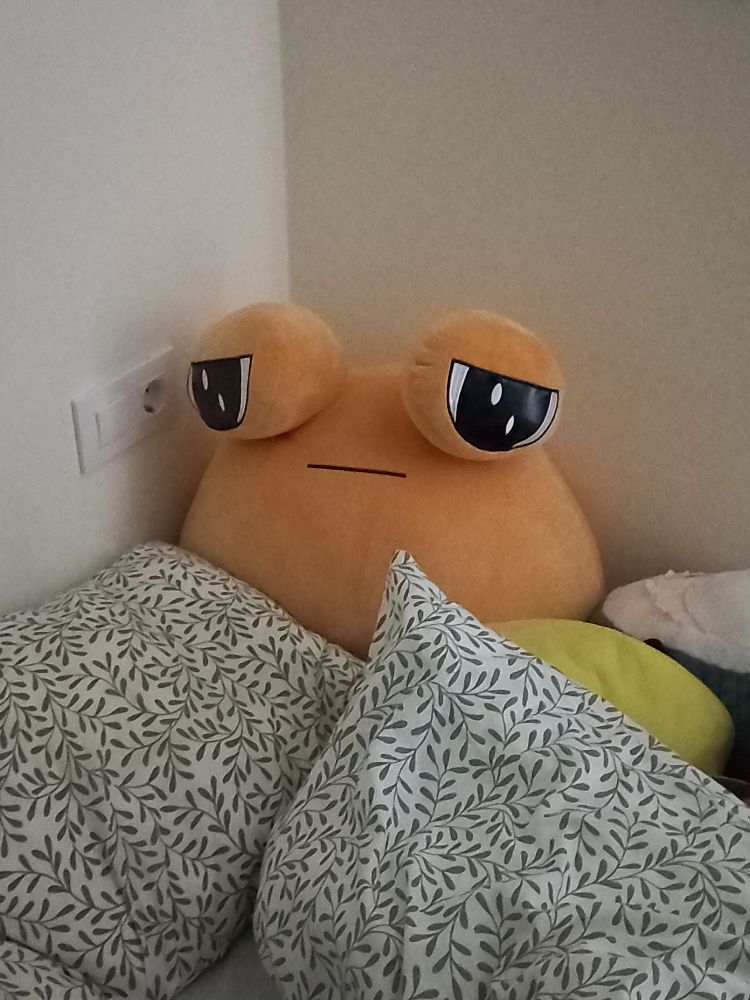 sad Pou in bedsheets