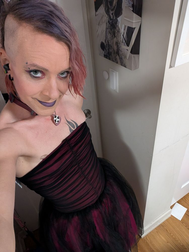 triss in her new red and black strapless dress