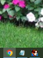 Screen capture of a Windows taskbar icon of Leon Kennedy from Resident Evil 2 (1998) for PC.