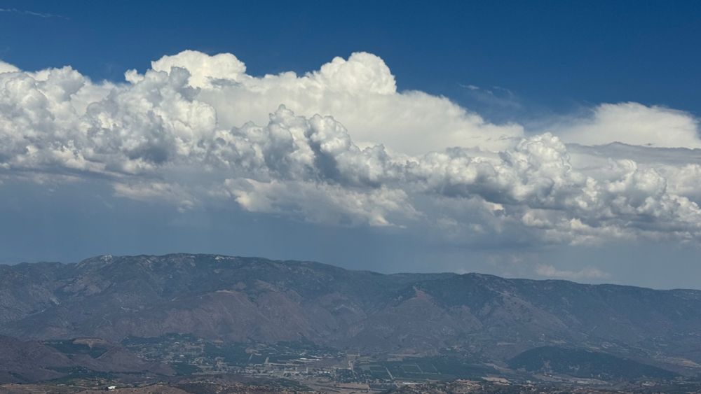 Cumulus clouds east of Palomar Mountain/Cleveland national Forest. Photo from 3500โ MSL over Valley Center, CA.