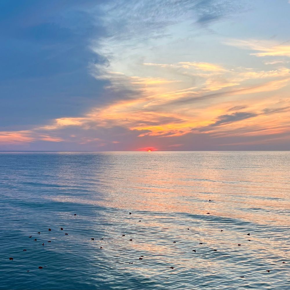 The sun setting over Lake Michigan