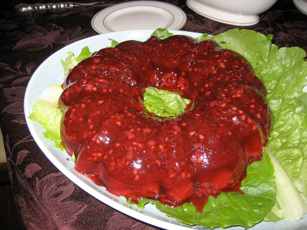 A jello salad which looks...questionable. But is traditional American cuisine. Unlike tacos. Or barbeque (African), Sushi (Japan), Gyros (Greek). Thank heavens for Fre....er...Freedom Fries