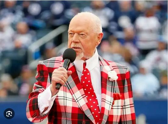 Don Cherry in a ridiculous plaid suit on teeve.