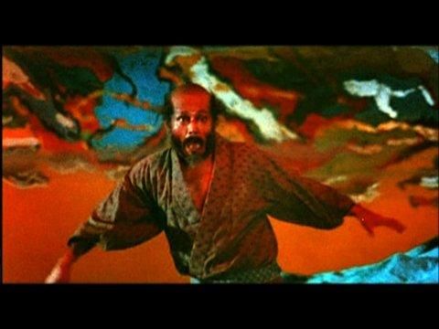 Screenshot from the film Kagemusha featuring actor Tatsuya Nakadai in a dream sequence looking very frightened.