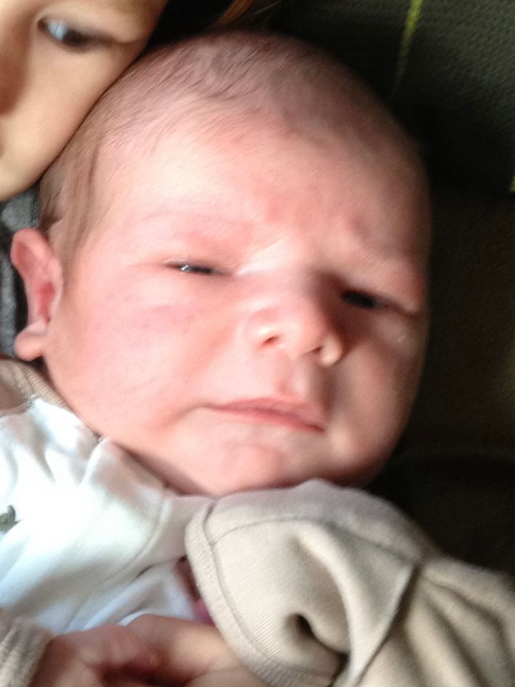 Very concerned infant face