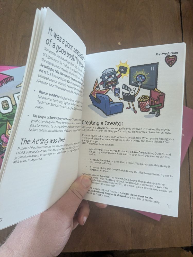 The inside of the FLOPS TTRPG books
