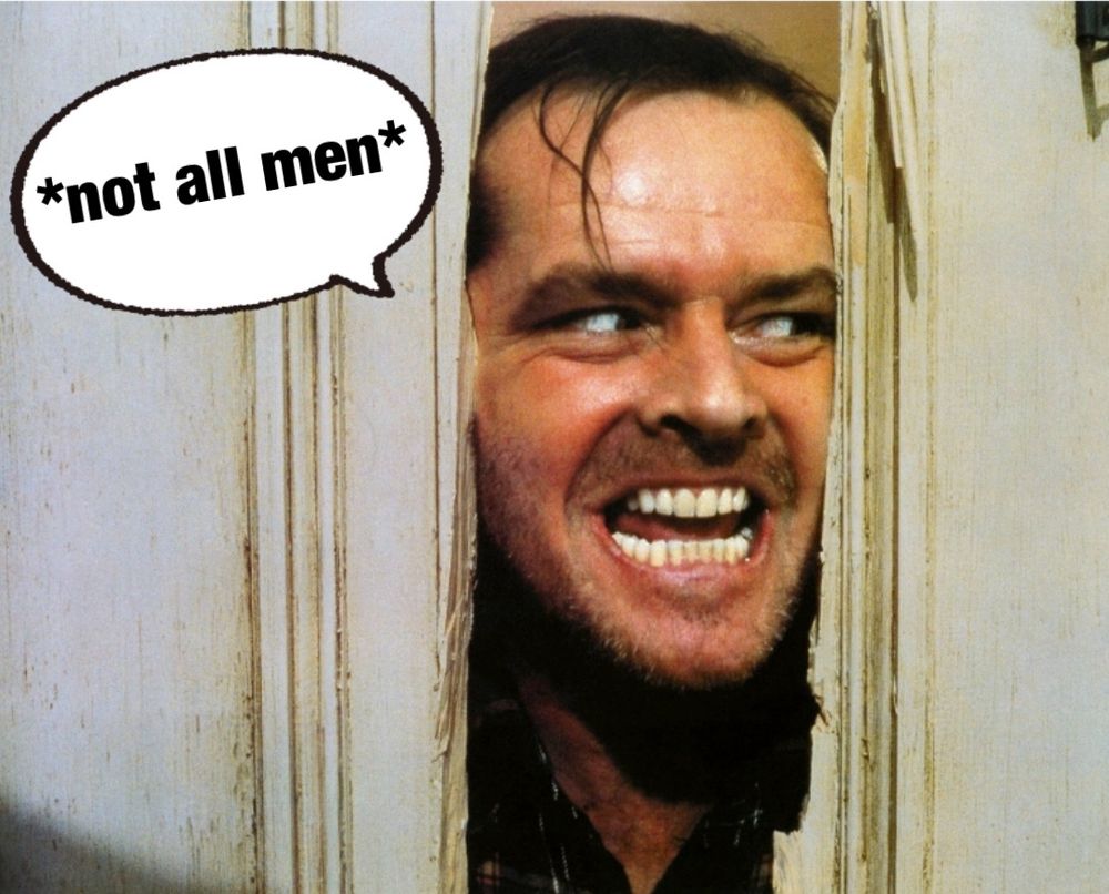 Aus dem Film the shining: Nicholson schaut mit fletschenden Zähnen aus der Wand: daneben Sprechblase: *not all men*