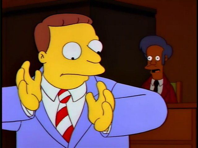Lionel Hutz in a red and white striped club tie, in a half-Windsor knot