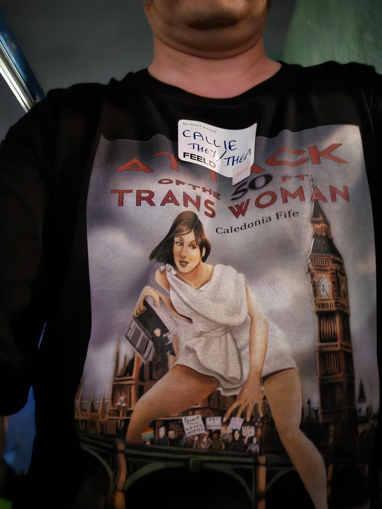 Attack of the 50ft trans woman tshirt as worn by me on a rooftop in Brixton