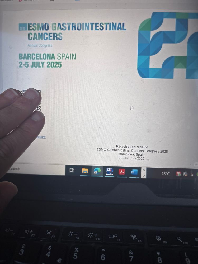 Laptop screen with esmo registration receipt 