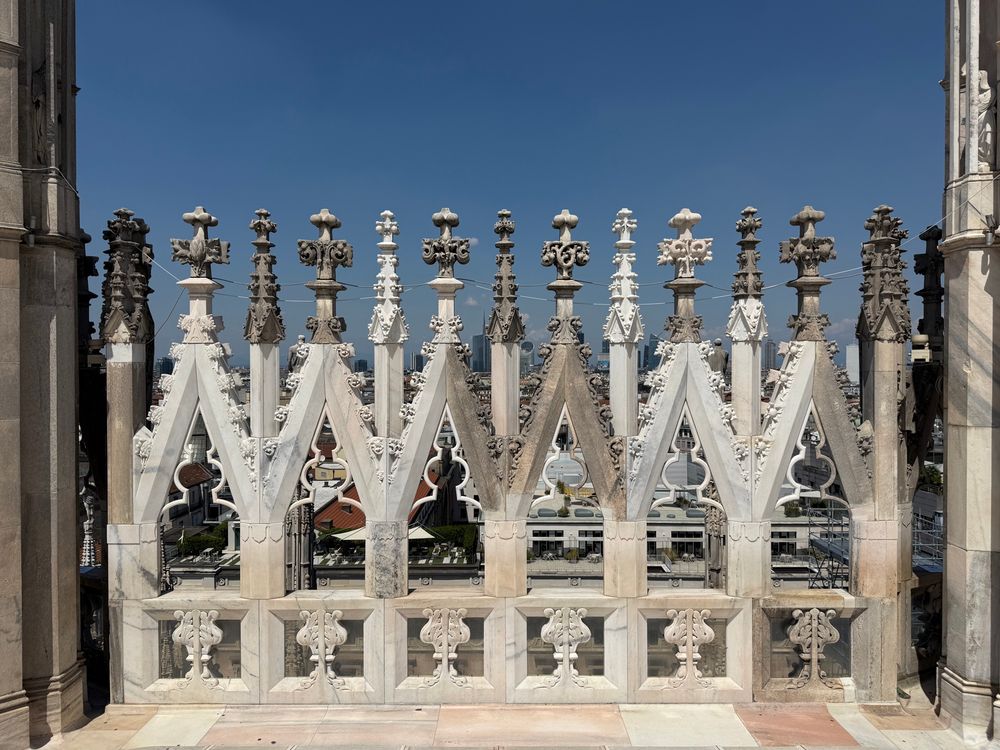 Exterior of Duomo Cathedral in Milan showing parts that have been replaced or cleaned.