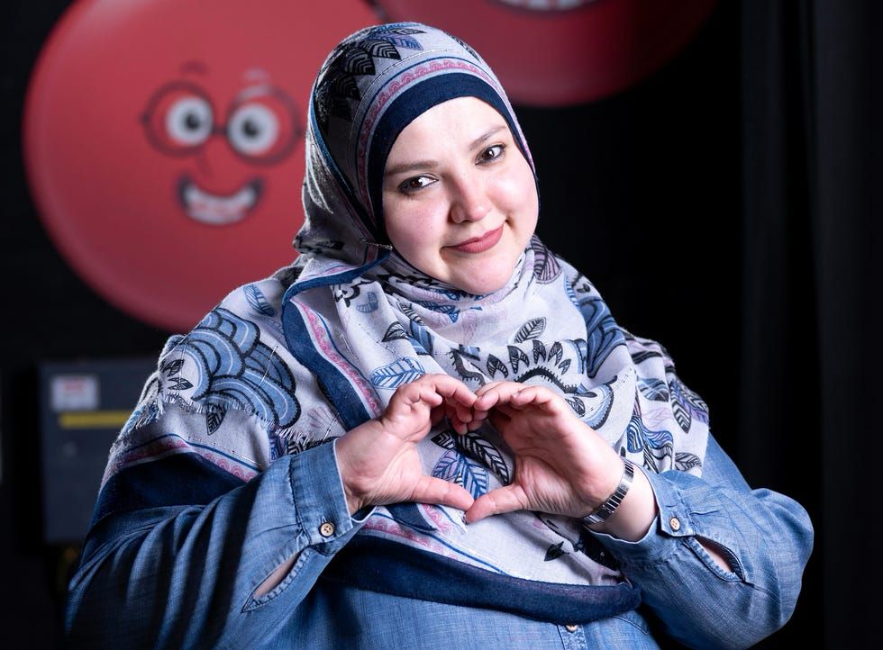 Fatiha El-Ghorri doing the heart hand thing on Taskmaster.