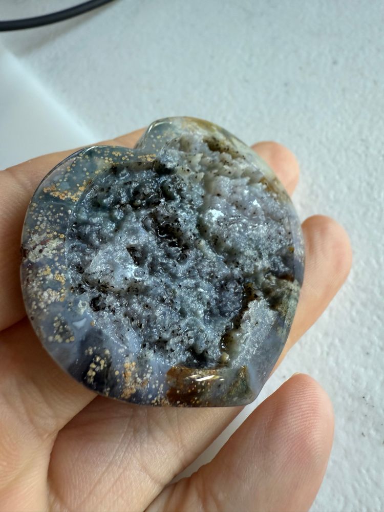 A heart shaped rock with a failed embossing job 