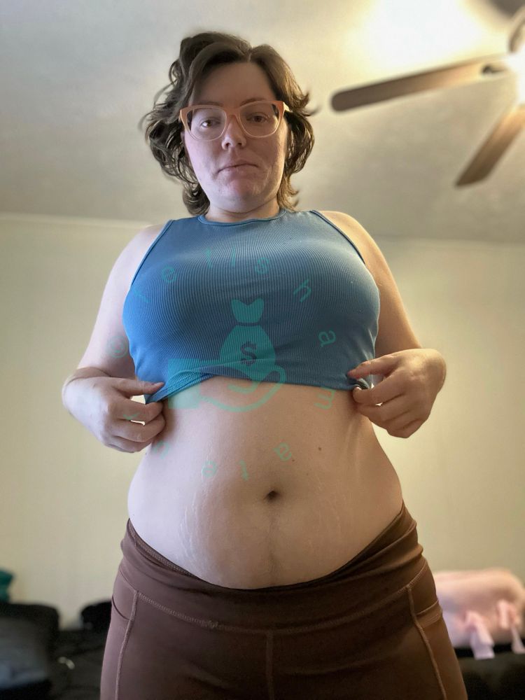 All four pics are of me, seductive but entirely clothed. Many positions, a blue crop top tank, and brown yoga pants, and my summer glasses orange and white. 