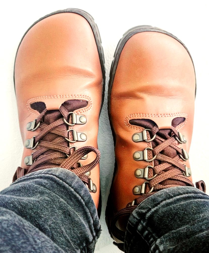 Brown shoes, looking a bit like Aziraphale's 