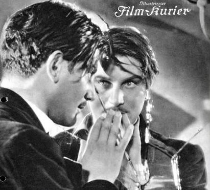 Anton seeing his reflection in a broken mirror, black and white